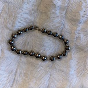 Silver bead bracelet.